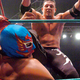 Mexican wrestler Rey Mysterio Jr. absorbs a brutal hit during a non-televised WWE event.